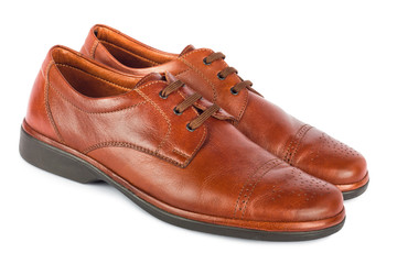 The brown elegant men's shoes on the white isolated background