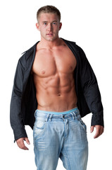 Muscle sexy young man posing in black shirt