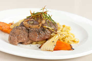 tasty steak with pasta