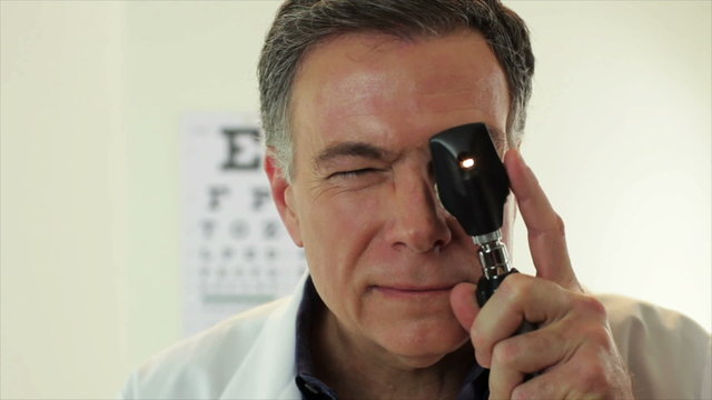 Optometrist POV checking patient
