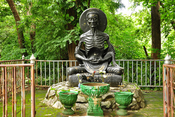 Image of Buddha statue of starving symbol