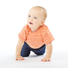 active one year baby crawling over white background