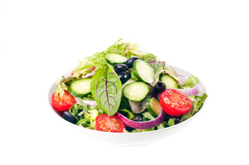 Isolated bowl of fresh mesclun salad