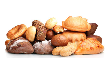 tasty breads and rolls isolated on white