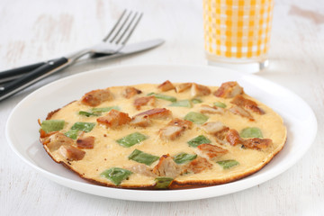 Omelet with meat and vegetables
