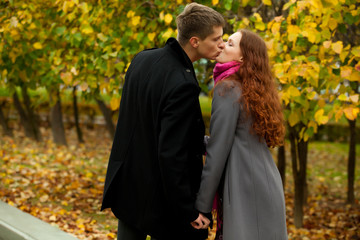 Fototapeta premium young woman and man kissing