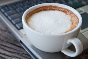 laptop  and coffee cup