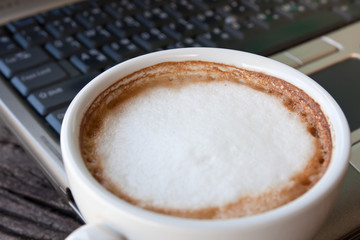 laptop  and coffee cup