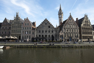 Fototapeta na wymiar Houses of the Graslei in Belgiums city Gand reflect in the water