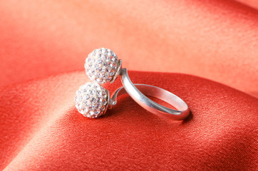 Fashion concept with ring on background