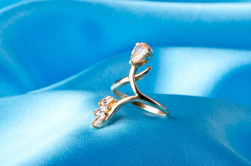 Fashion concept with ring on background