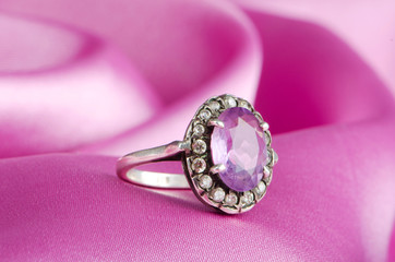 Fashion concept with ring on background