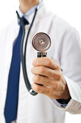 Male doctor with stethoscope isolated