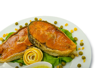 Salmon roasted and served in the plate