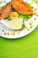 Roasted salmon in the plate