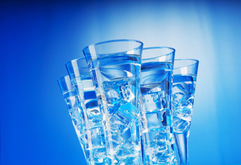 Water in the glass against gradient background