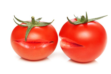 Two tomatoes with mouths