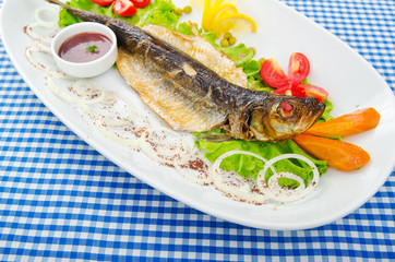 Fried fish in the plate