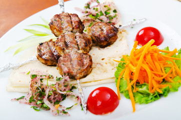 Meat cuisine - kebab served in plate