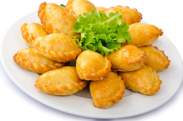 Patties stuffed with meat in the plate