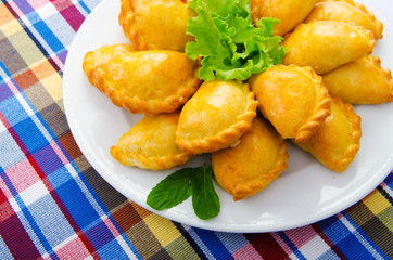 Plate full of tasty meat patties