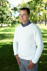 Young man in summer park