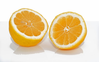 Fototapeta na wymiar Fresh Lemon Cut in Half Light Background