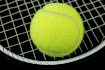 Tennis ball and racket