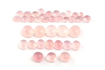 Rose quartz cabochons.
