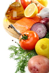 Raw salmon, vegetables and greens.