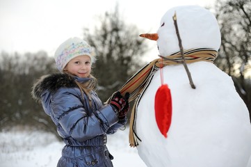 Girl with snowman