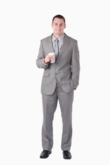 Portrait of a businessman holding a cup of tea