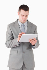 Portrait of a businessman using a tablet computer