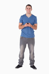 Portrait of a man holding a mobile phone