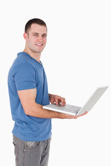 Portrait of a man using a laptop