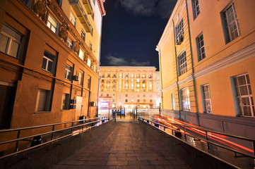night view from the court into the lighted street