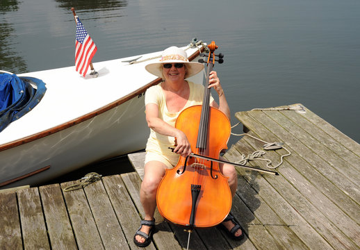 Female Cellist In Concert.