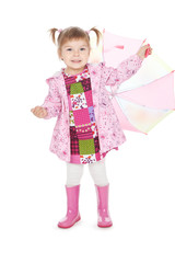 Funny little girl in  pink boots with umbrella over white