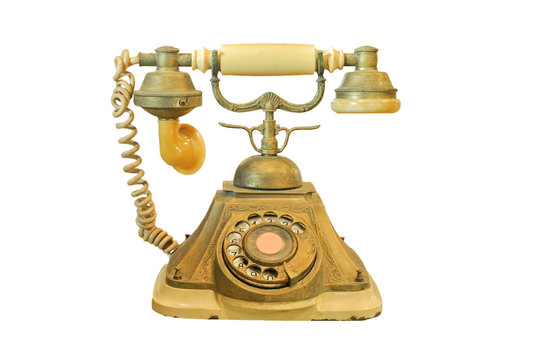 Old vintage telephone isolated on white
