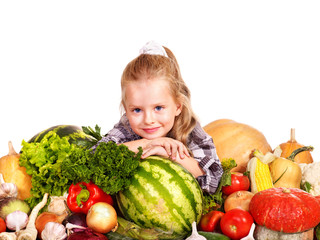 Fototapeta na wymiar Child with vegetable on kitchen.