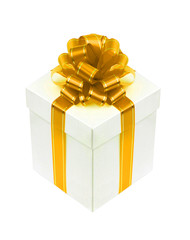 Beautiful white gift box with golden ribbon bow isolated on whit