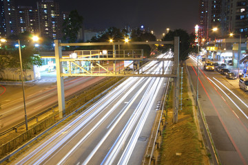 Fototapeta na wymiar Traffic in city at night