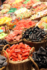 Candies sweets in La Boqueria food market in Barcelona Catalonia