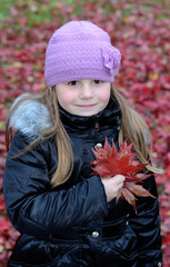 Autumn's vertical portrait of a young girl