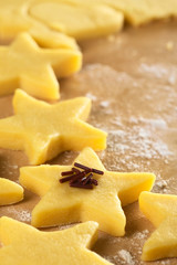 Unbaked star-shaped cookies with chocolate sprinkles
