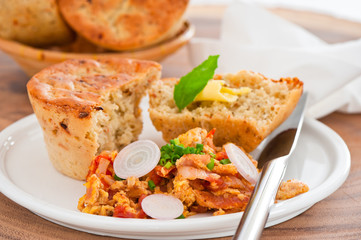 Homemade mediterranean bread with butter scrambled eggs and a le