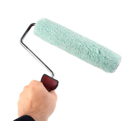 Obraz premium paint roller in hand