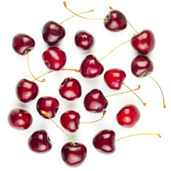 Red ripe cherries over white background
