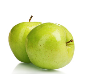 two juicy green apples isolated on white