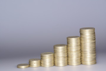 Increase of income like piles of coins